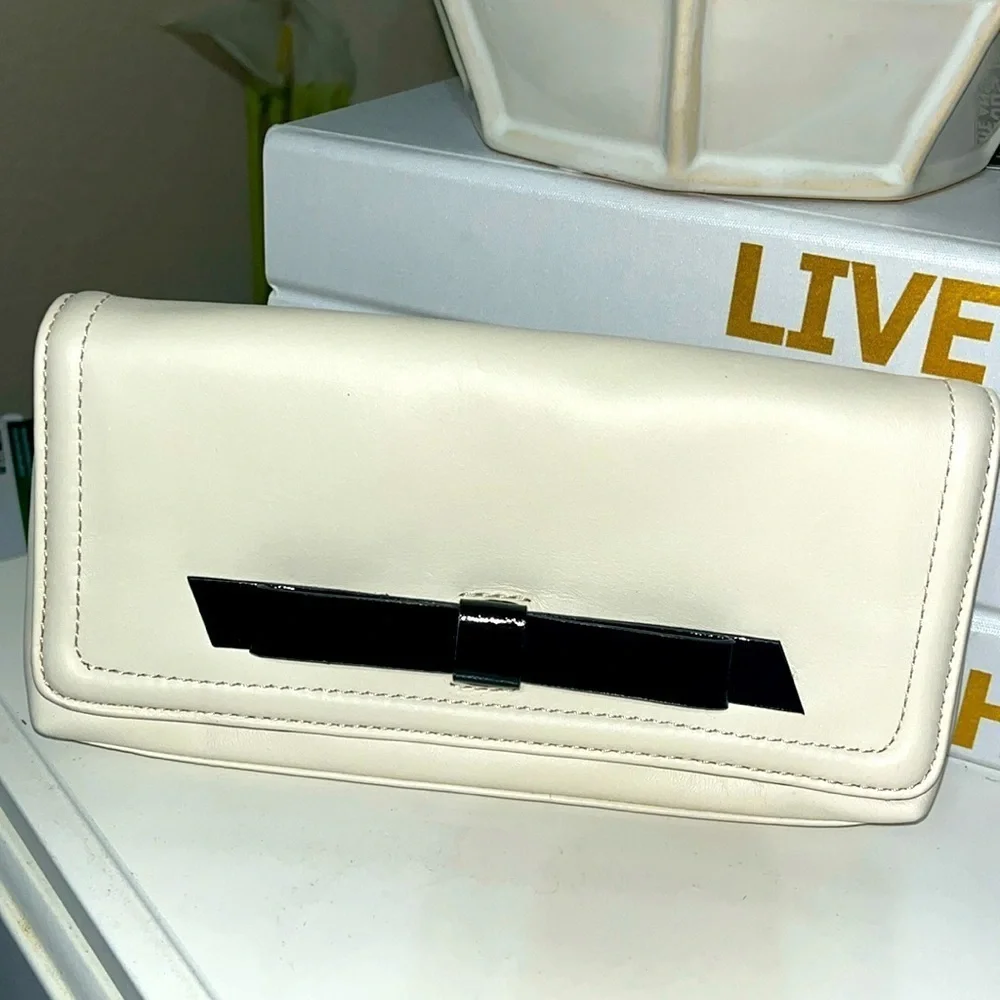 Kate Spade New York Cream Leather & Black Bow Tie Clutch
